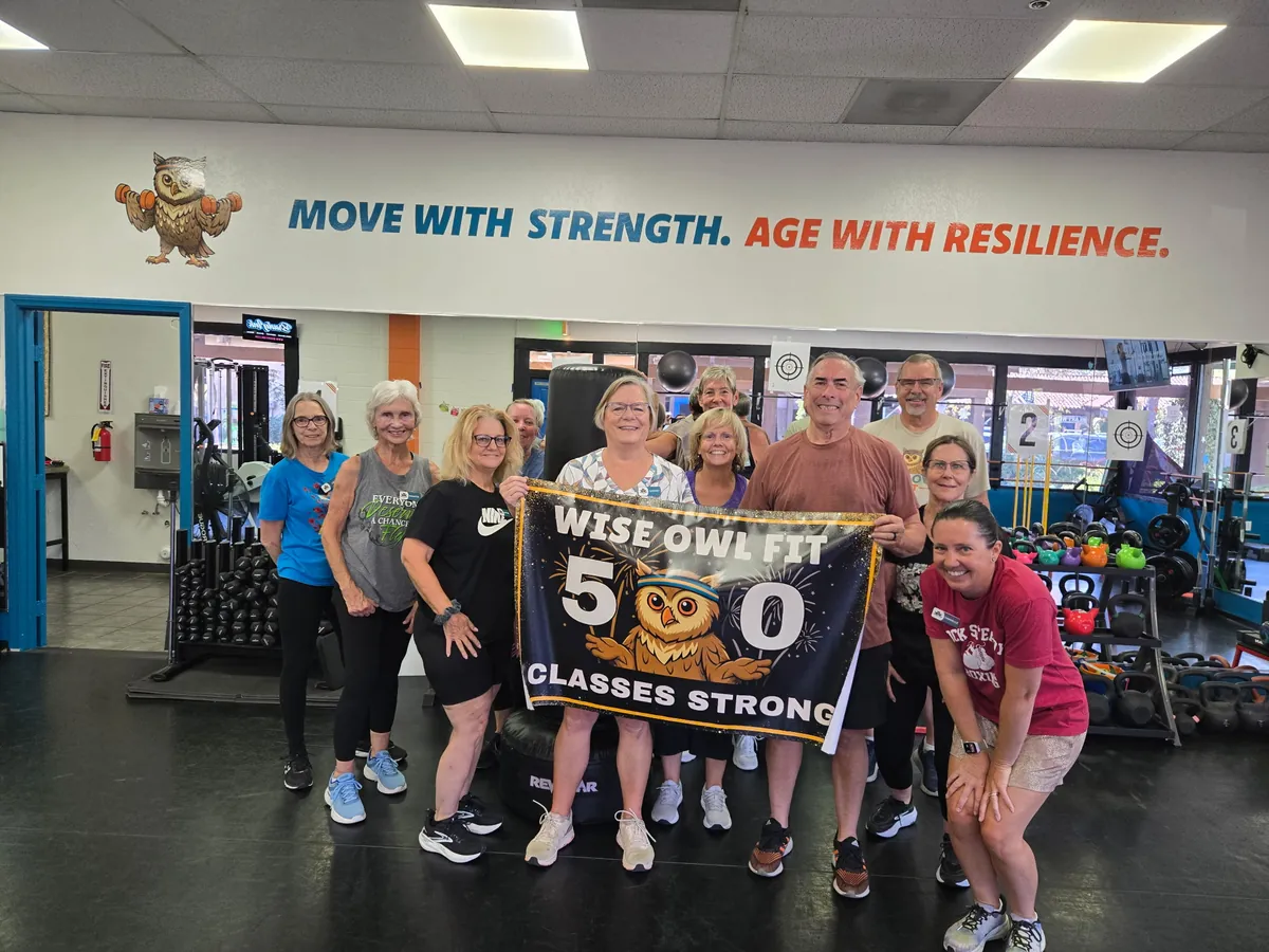 Wise Owl Fit members celebrating 50 classes strong