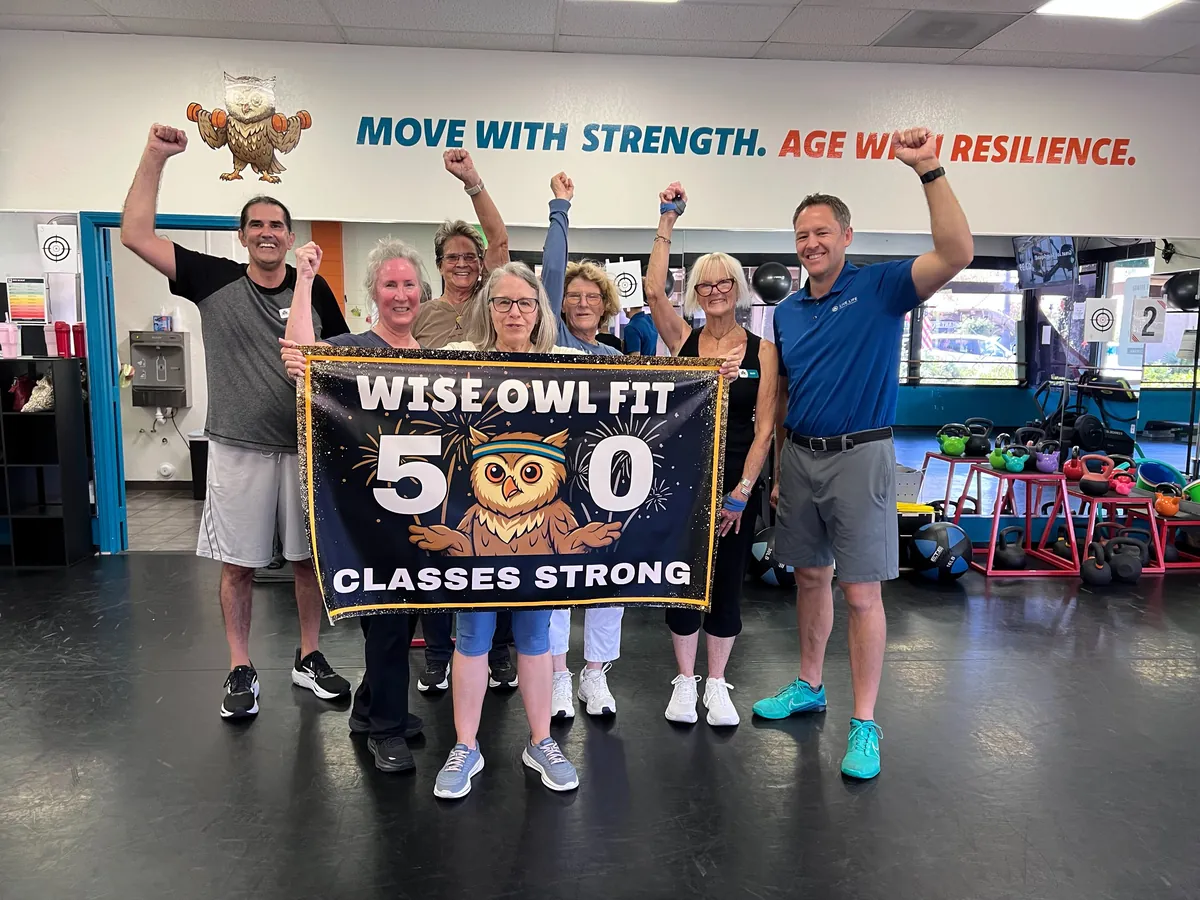 The Soar Squad cheering at a 50-classes milestone