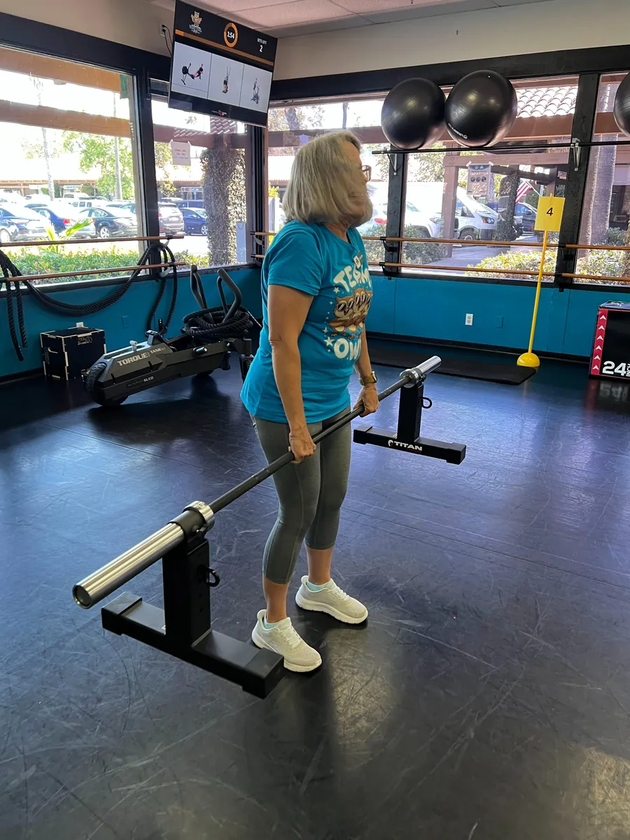 Strength training with a trap bar in Hoot Camp